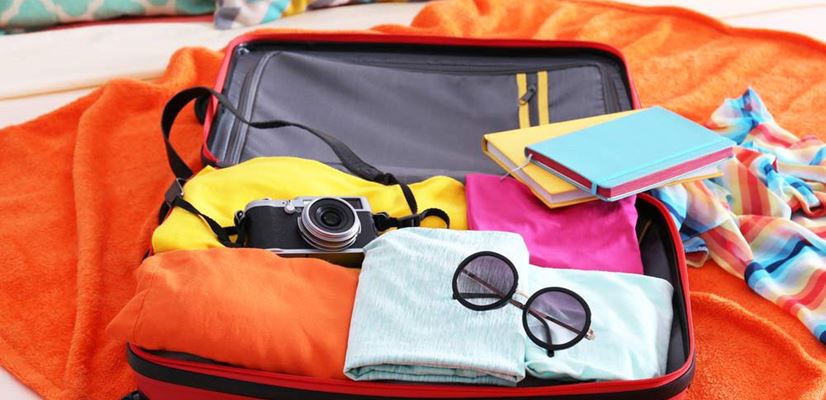 اصول صحیح چیدمان لباس در چمدان